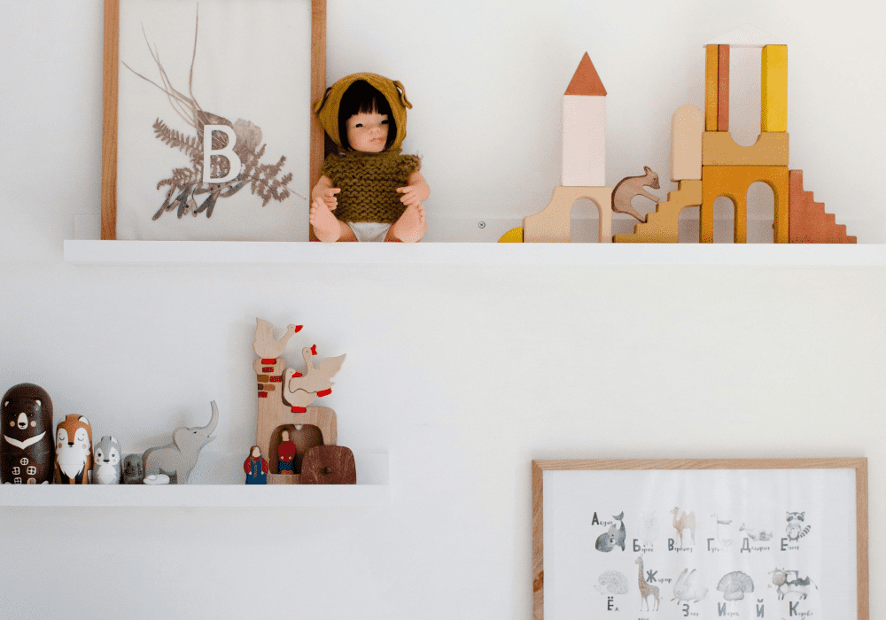 Floating shelves filled with toys.