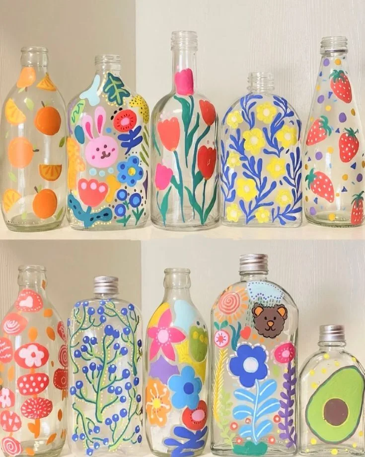 Hand-painted jars with colorful designs..