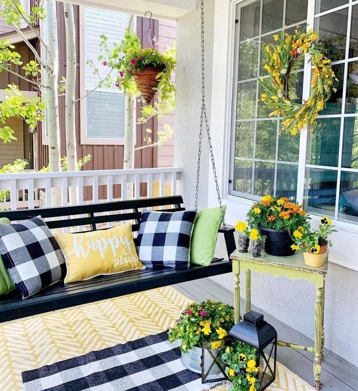 A yellow and black porch decor.