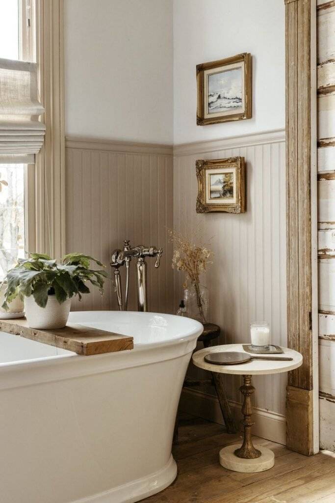 A beige luxury farmhouse bathroom.