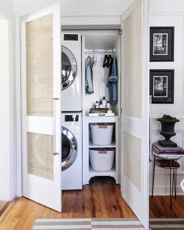 Laundry closet hiden under cane cabinet doors.