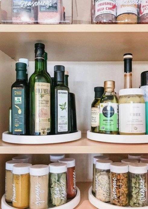 A pantry with lazy susan turntables.