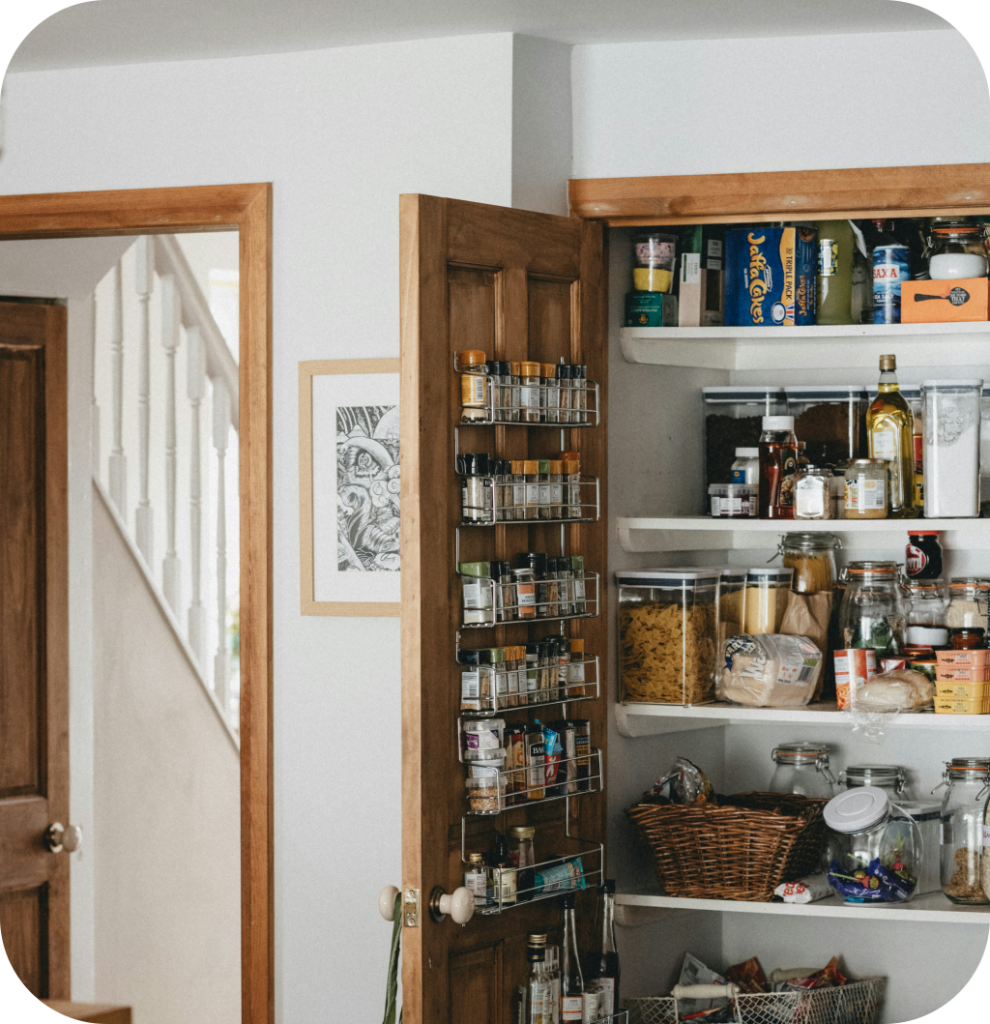 A pantry with a door storage rack.