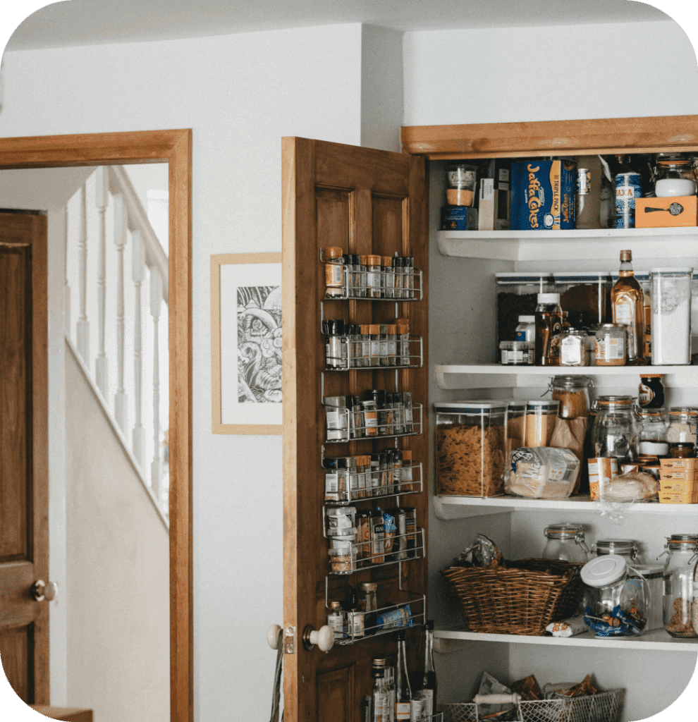 A pantry with a door storage rack.