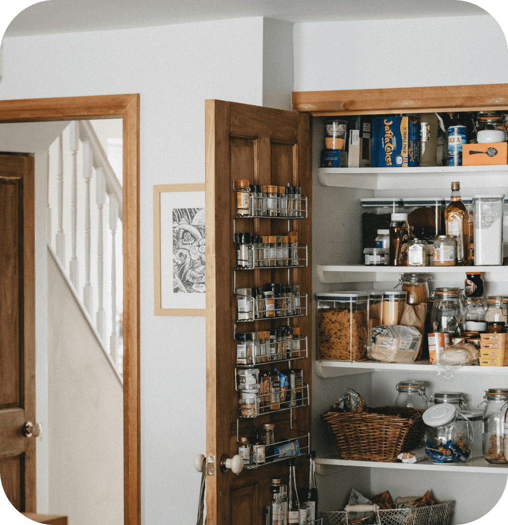 A pantry with a door storage rack.