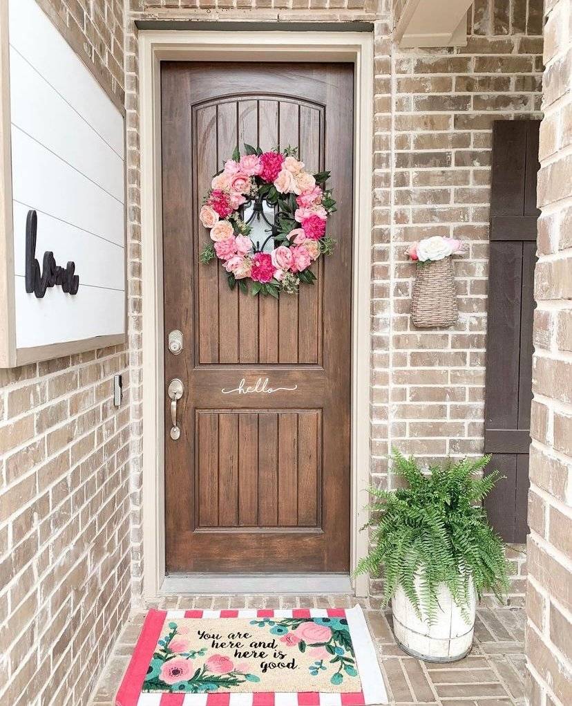 A brown porch with pink touches.