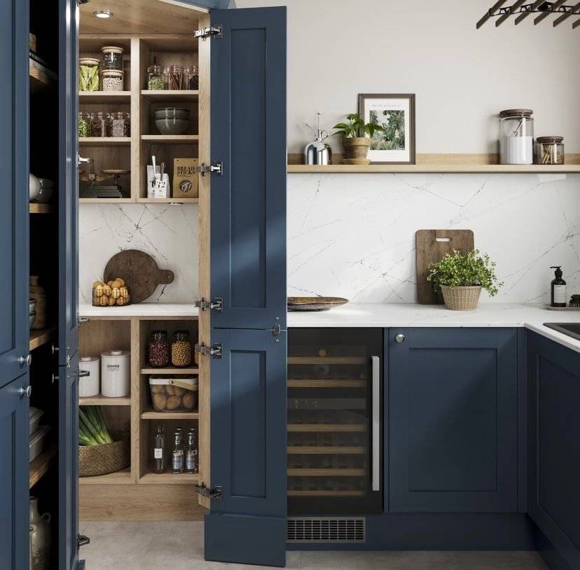 A blue walk in pantry in the kitchen corner.