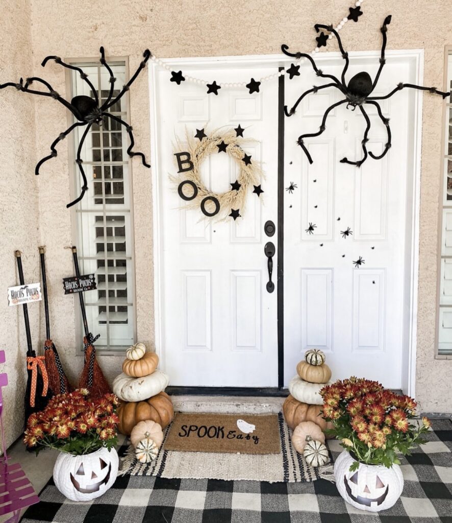 Big spiders with pumpkins.