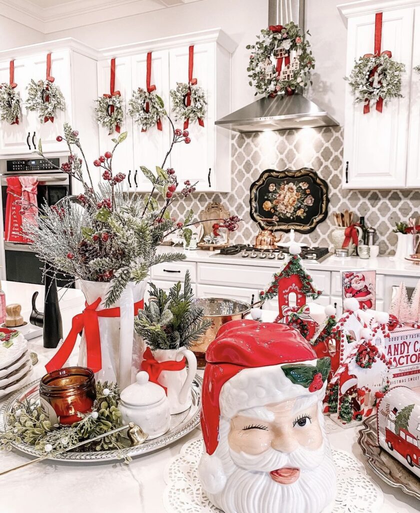 A Christmas tray with pine branches and red ribbon bows.