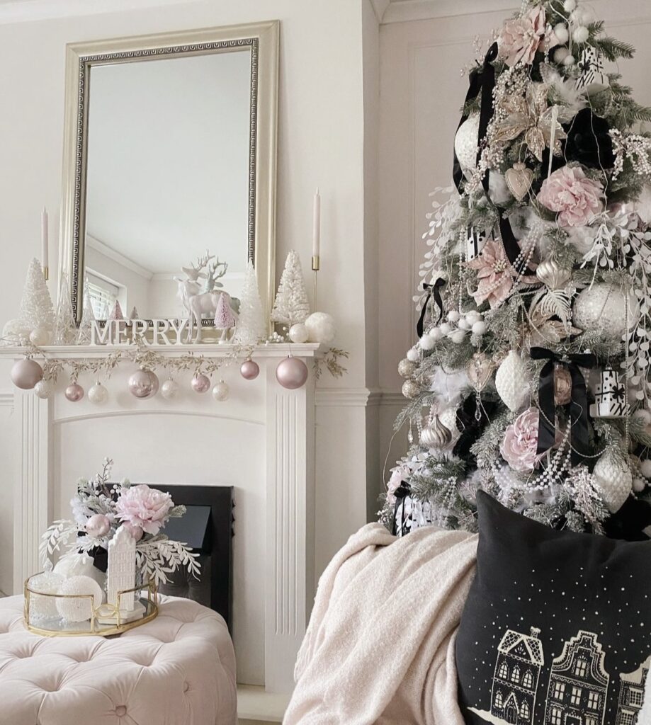 A mantel filled with white and pale pink balls.