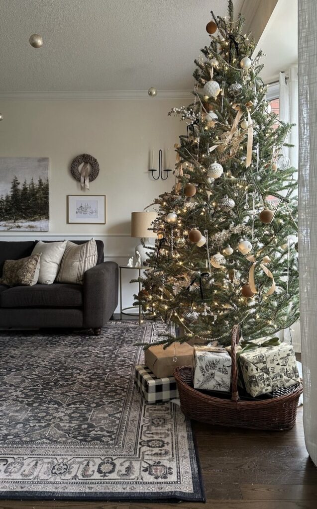 A traditional Christmas tree with bead garlands and gold ribbon bows.