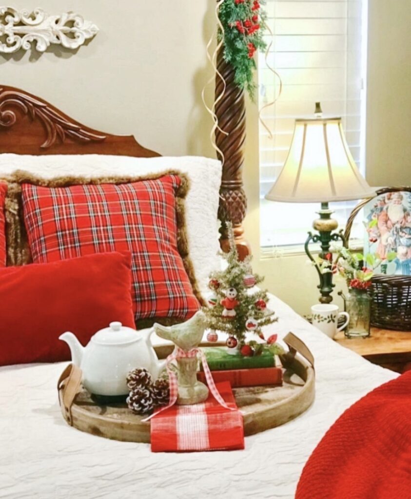 A Christmas tray on a bed.