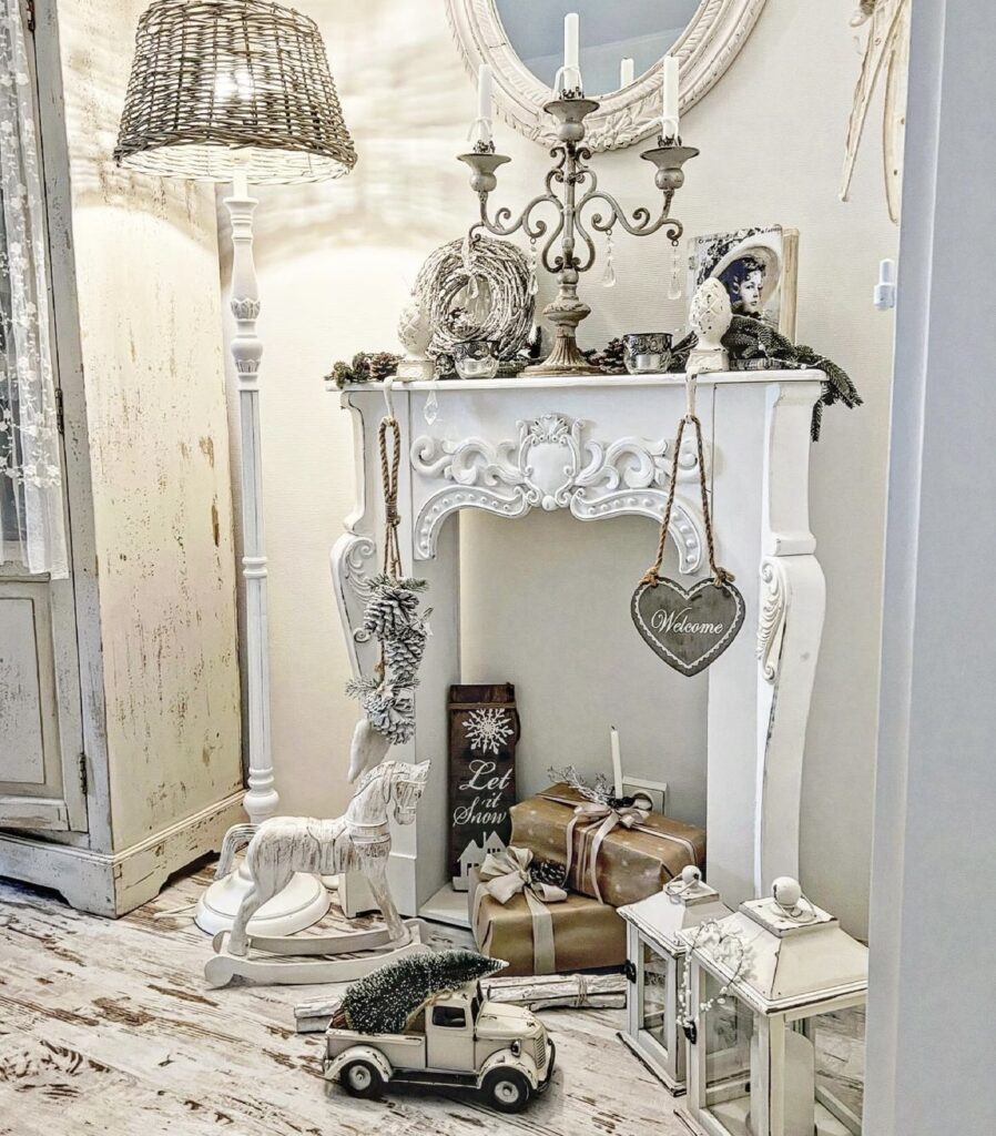 A white mantel with a white candelabra.