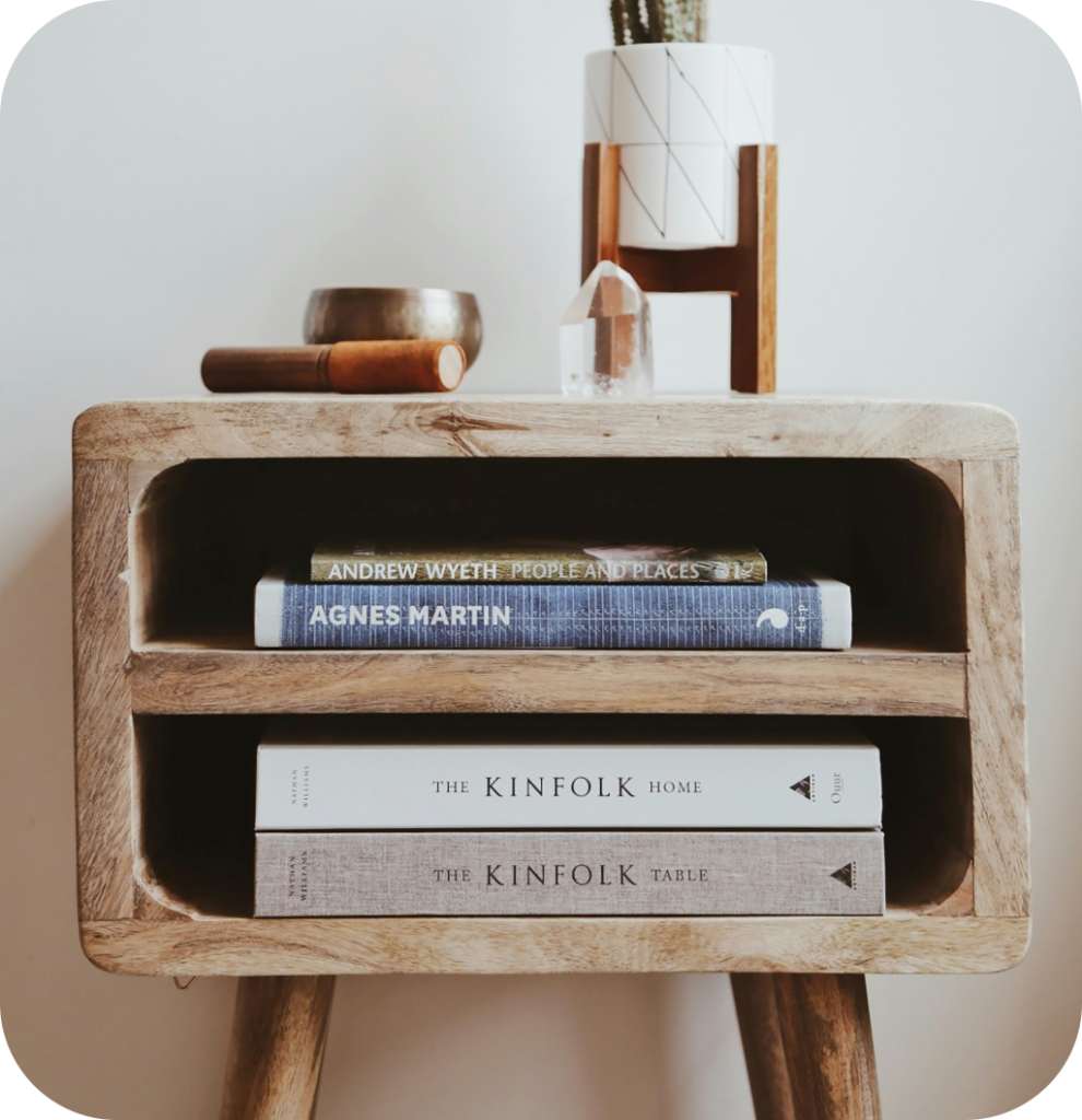 A rustic nightstand made of wood.