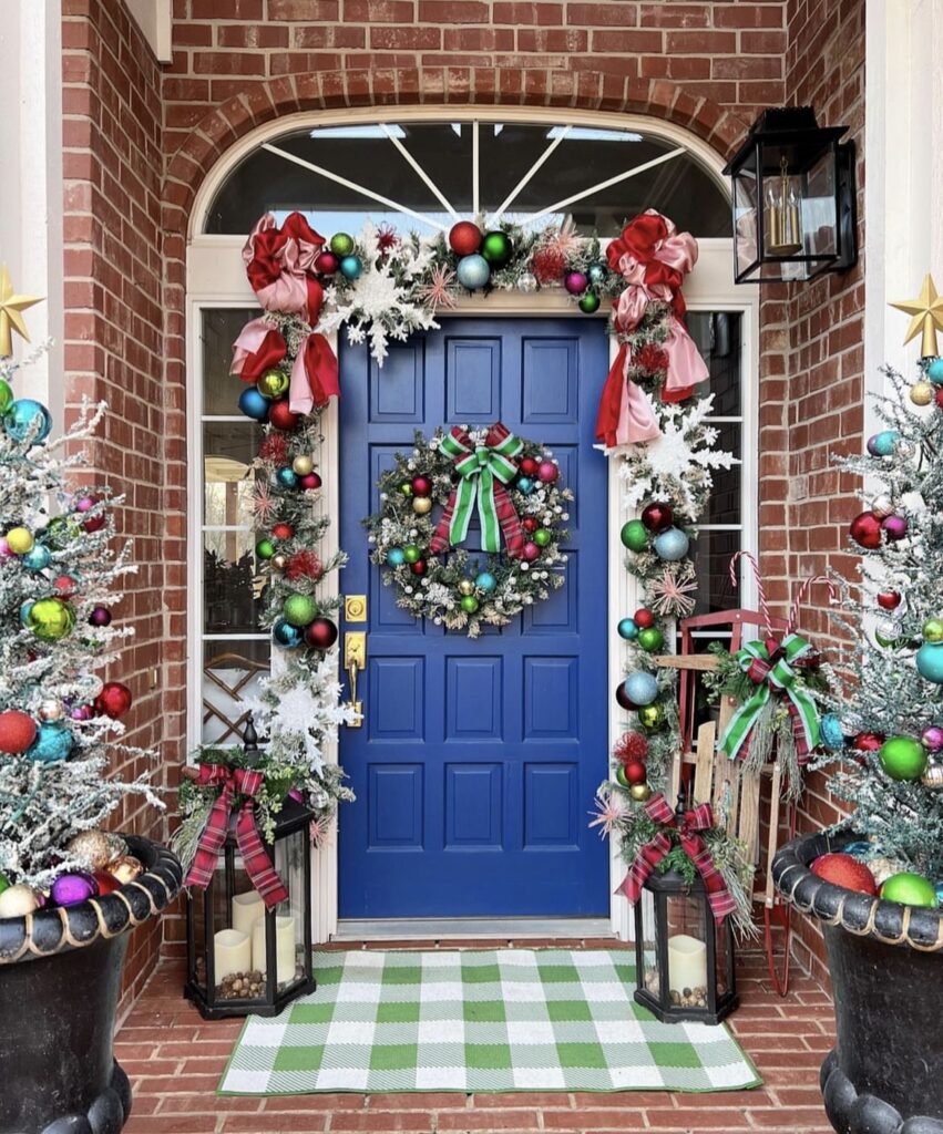 A pine branch garland with multicolor Christmas balls.