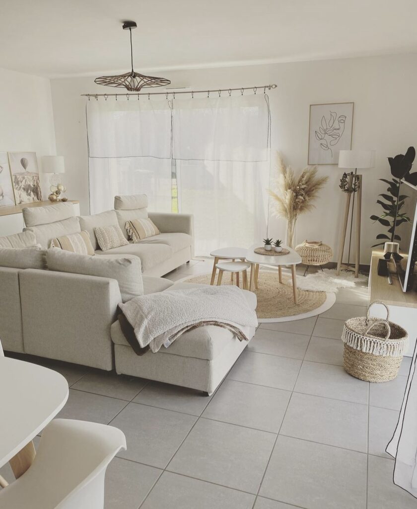 A cozy living room with a neutral color palette and woven decorative items.