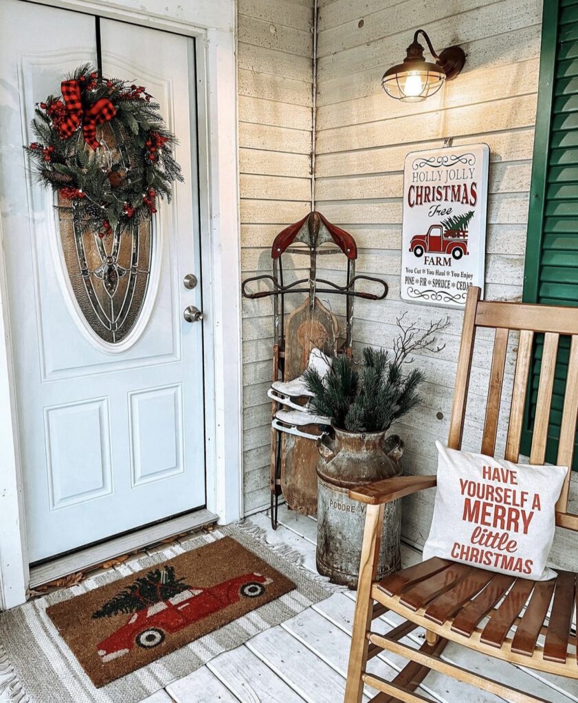 A Christmas porch with a sledge.