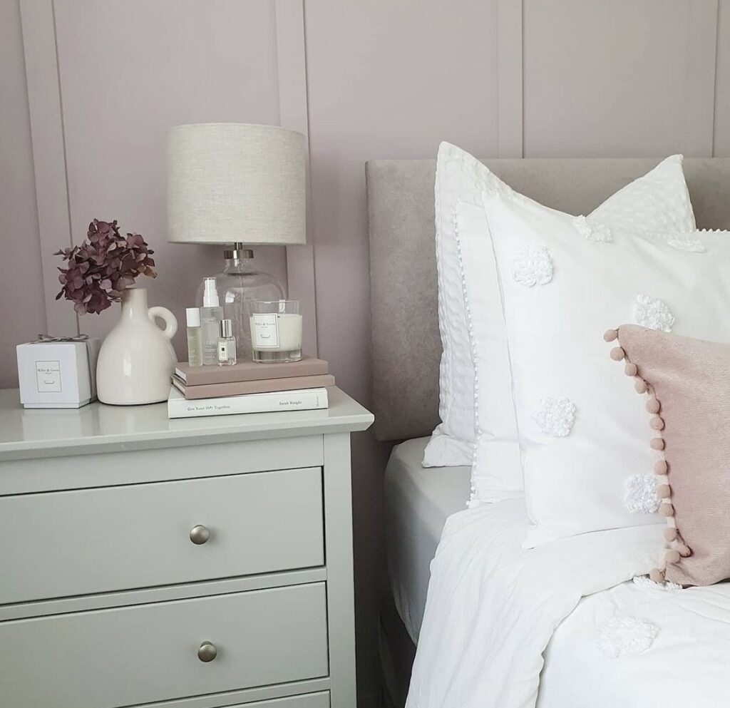 A light purple and light green bedroom.