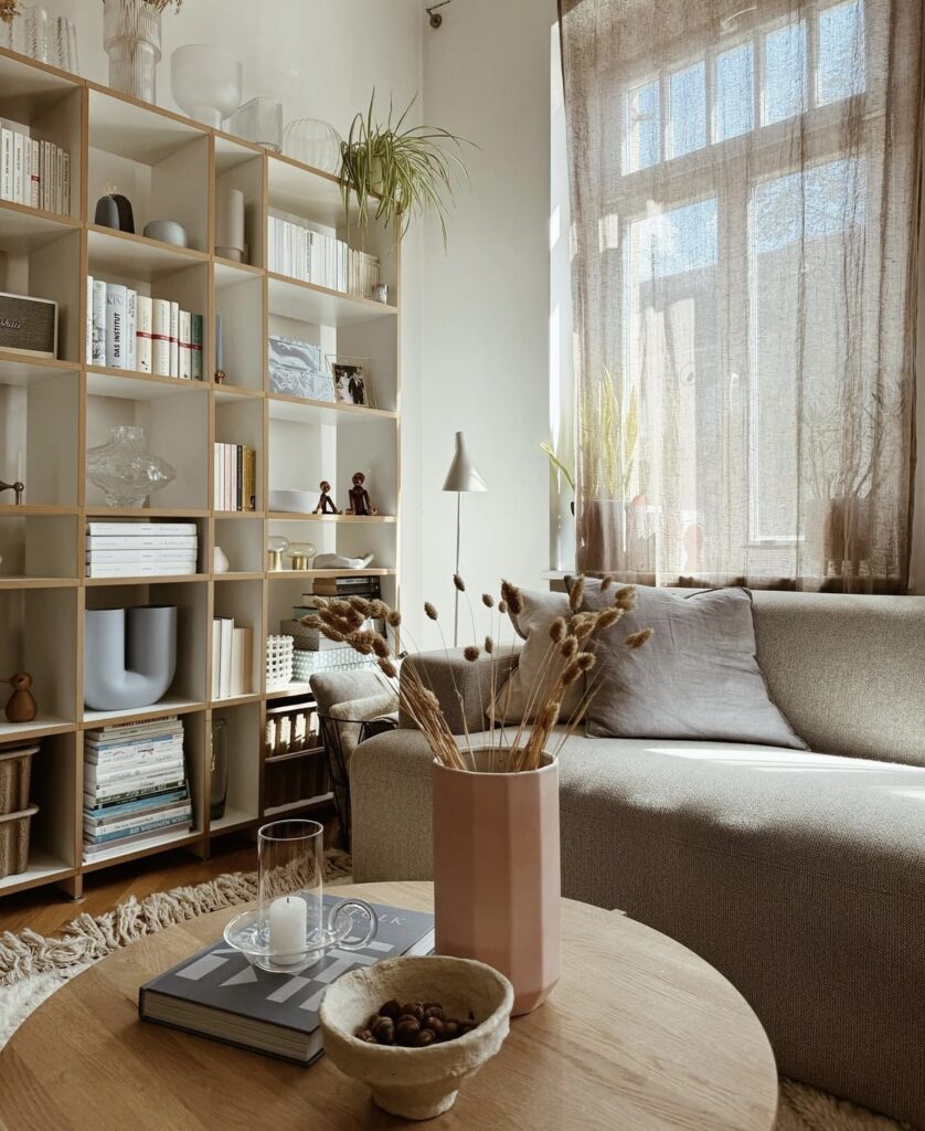 A cozy living room with modern vases.