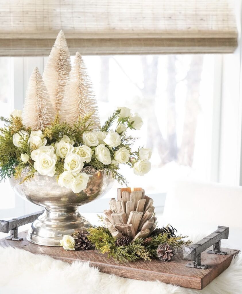 White flowers in a silver vase.