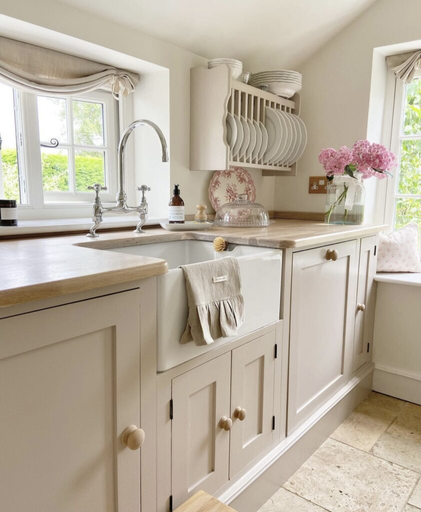 A farmhouse kitchen with an apron front sink.