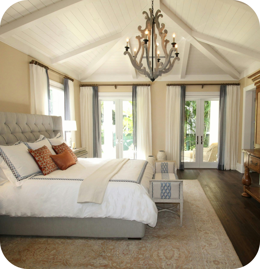 An elegant bedroom with a neutral color palette.