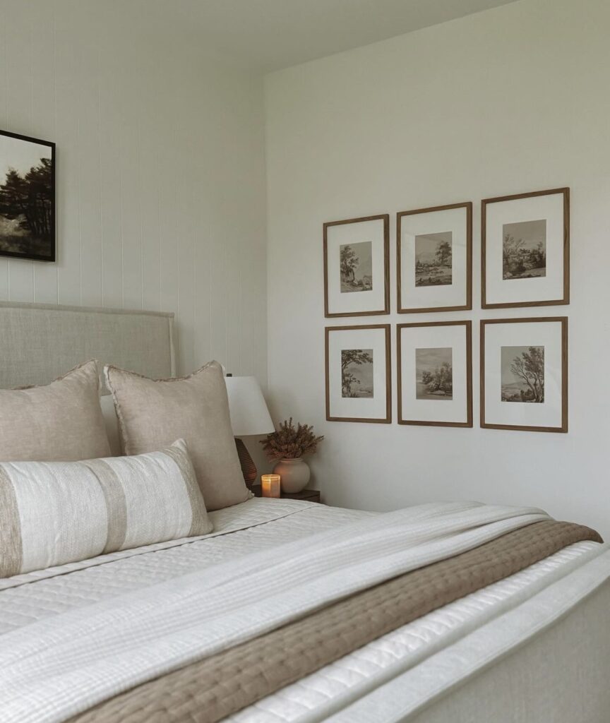 A neutral bedroom with a gallery wall.