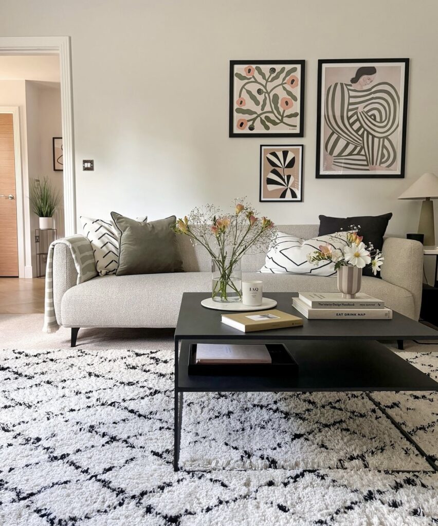 A living room with a modern gallery wall.