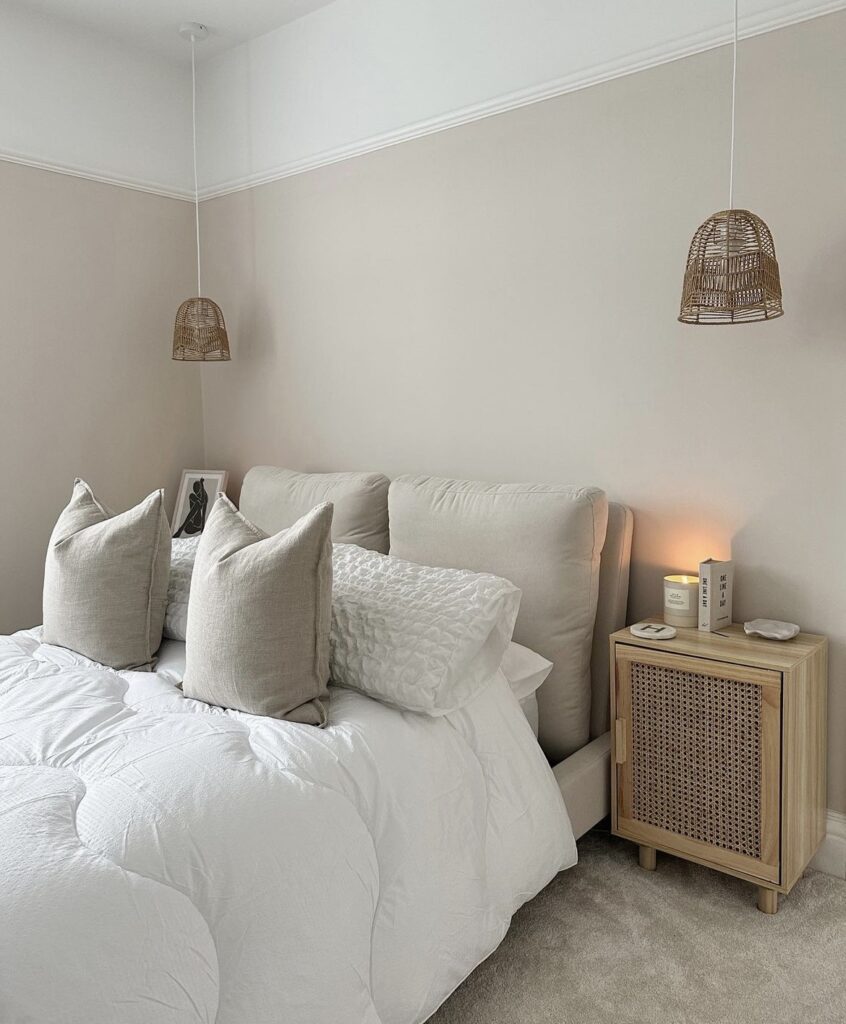 A neutral bedroom with woven furniture.