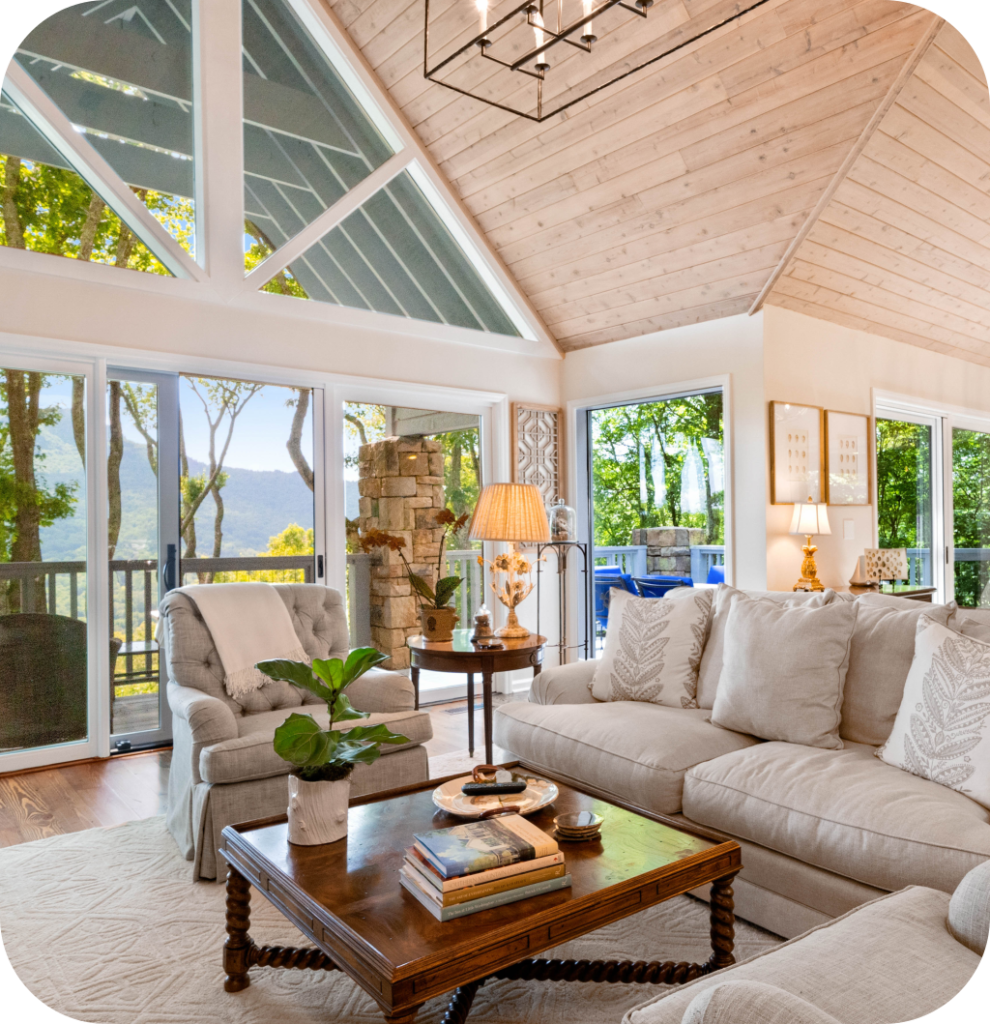 A neutral living room with wooden furniture.