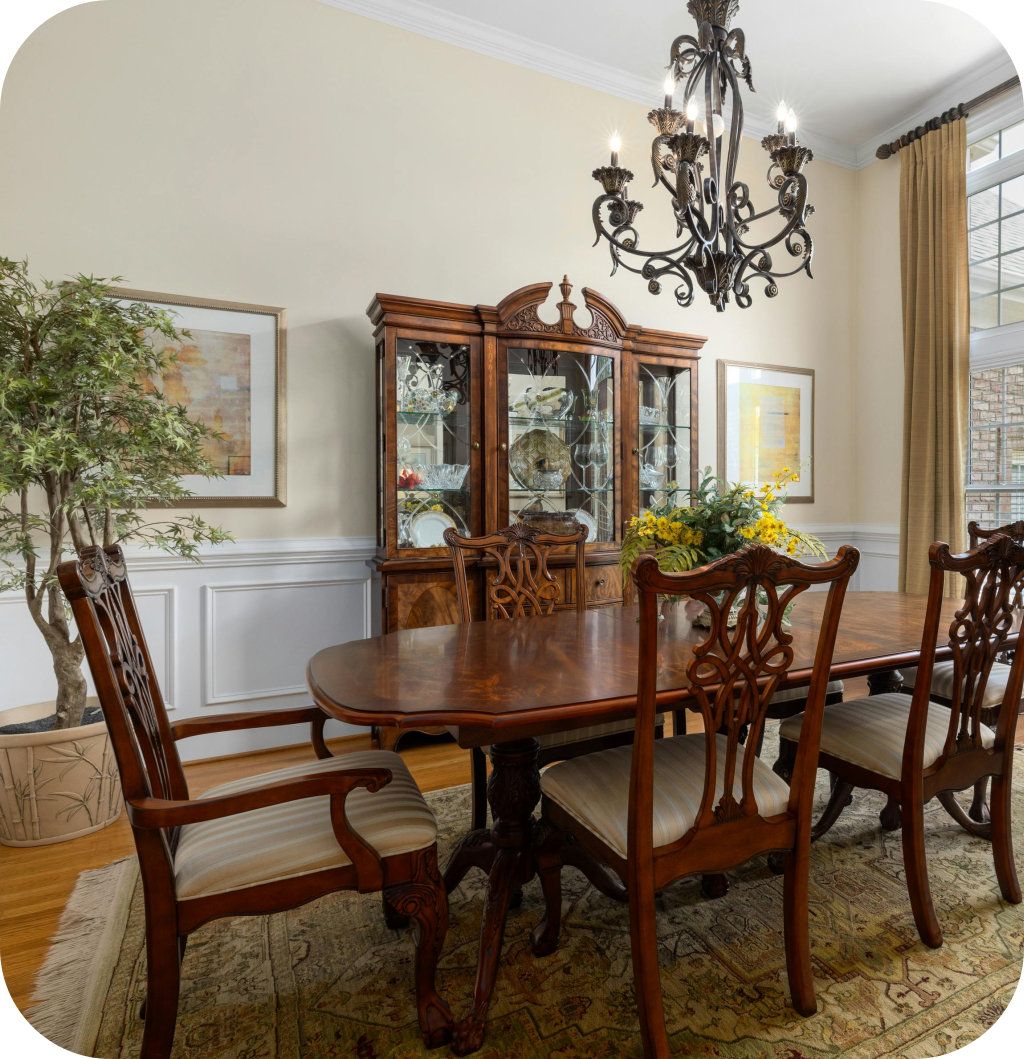 A vintage living room with wooden furniture.