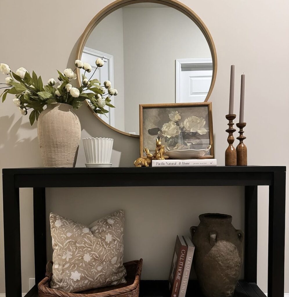 An entryway with gold rabbit figurines.