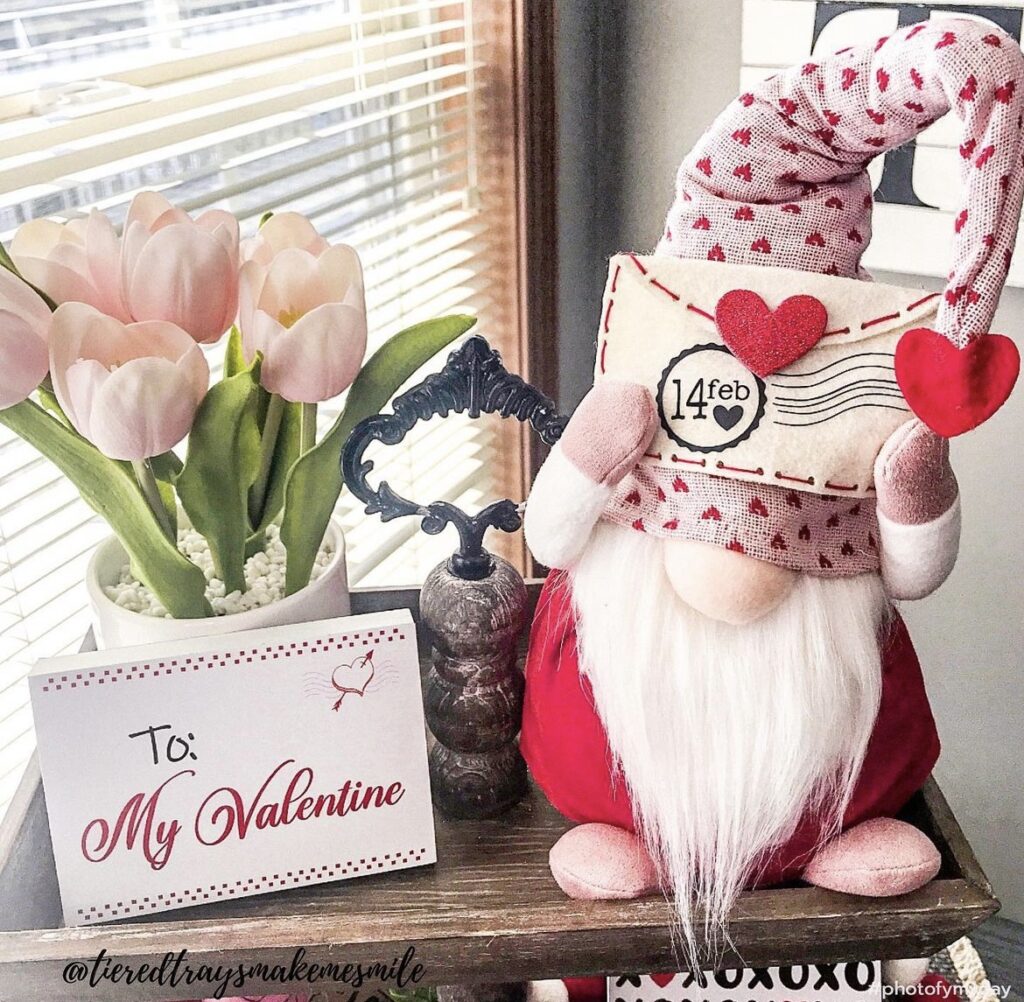 A Valentine gnome with tulips.