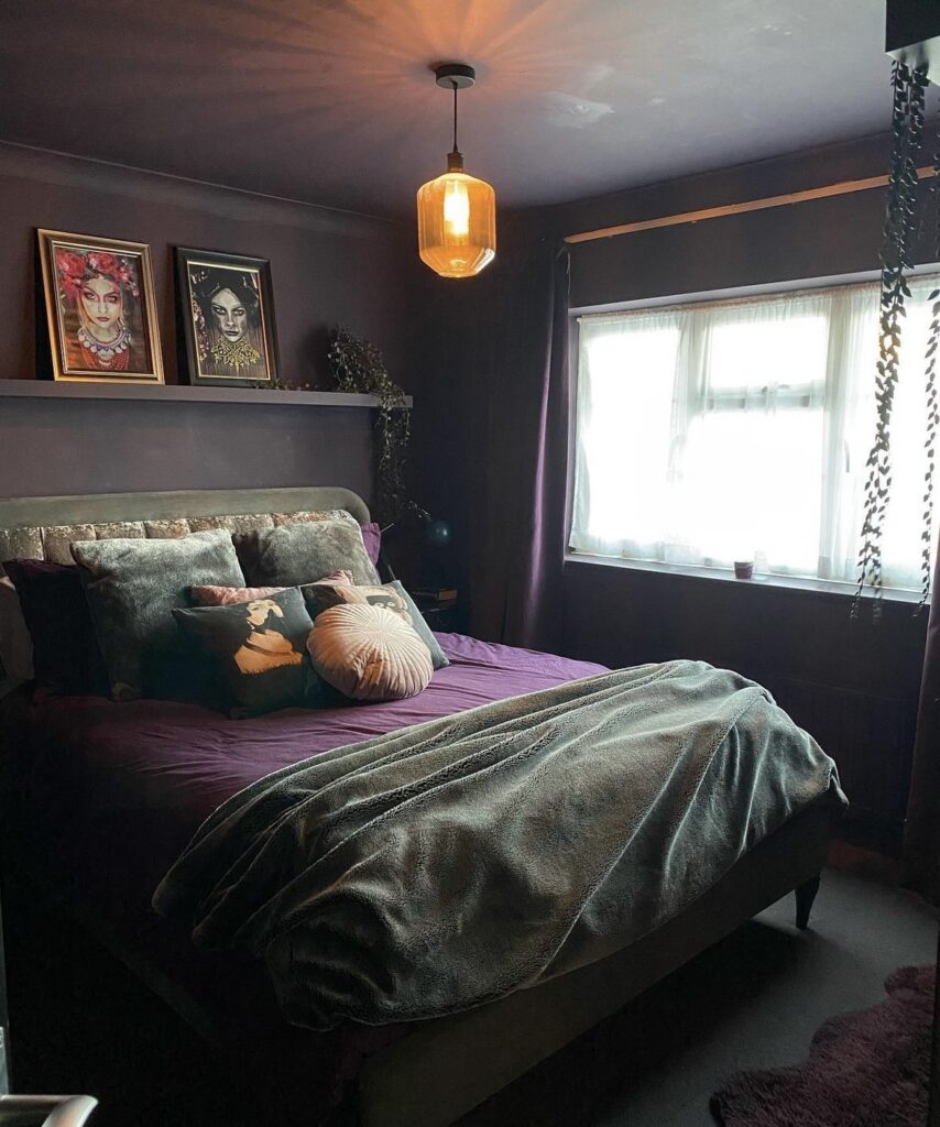 A bedroom with purple touches.