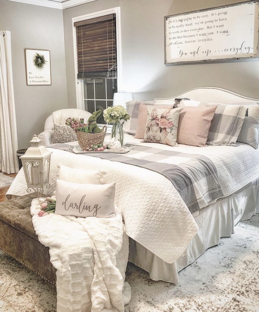 Fresh flowers with rabbit figurines in a bedroom.