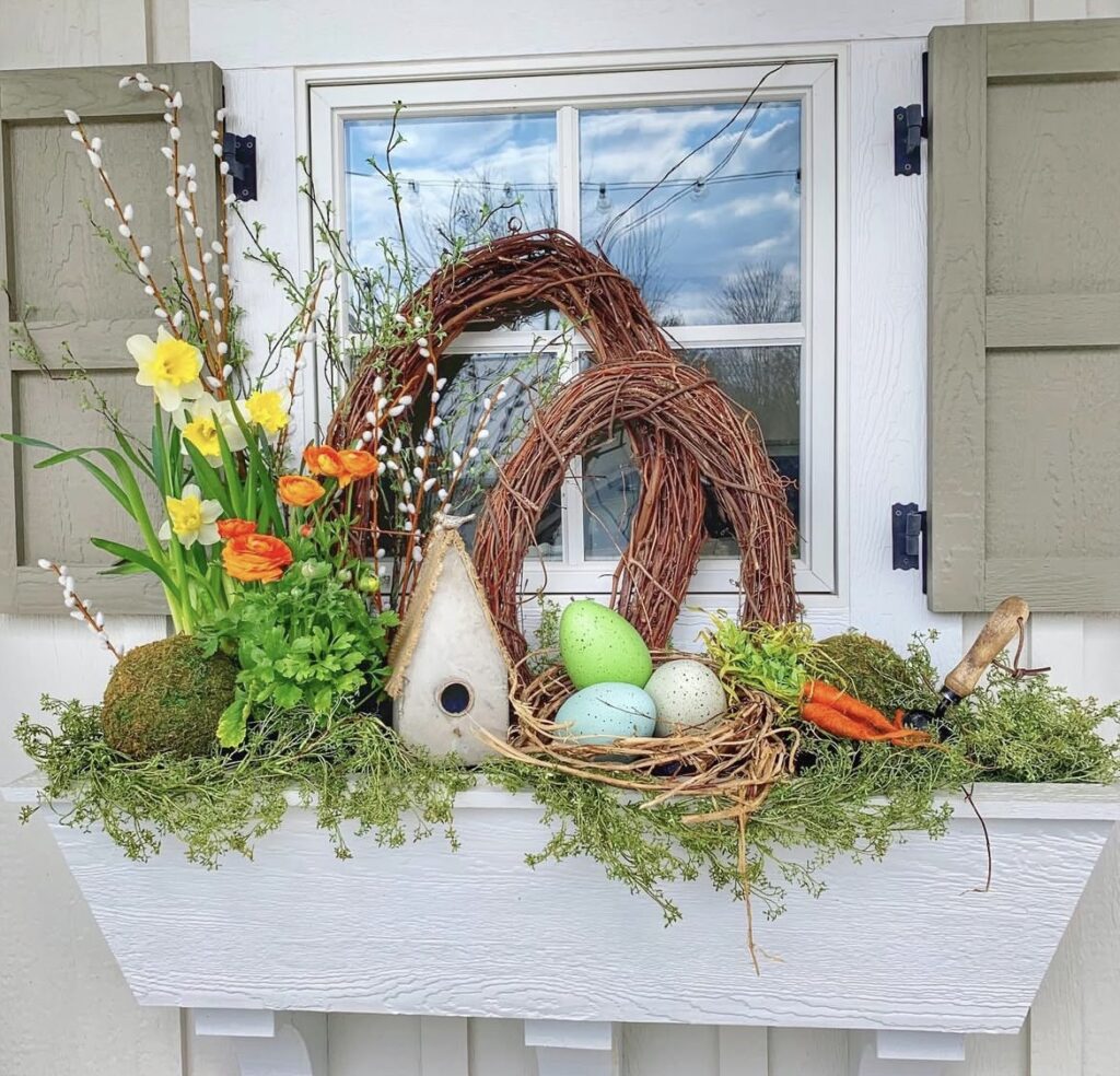 A planter filled with moss and Easter eggs.