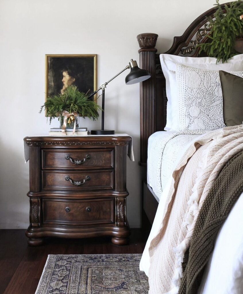 A bedroom with vintage furniture.