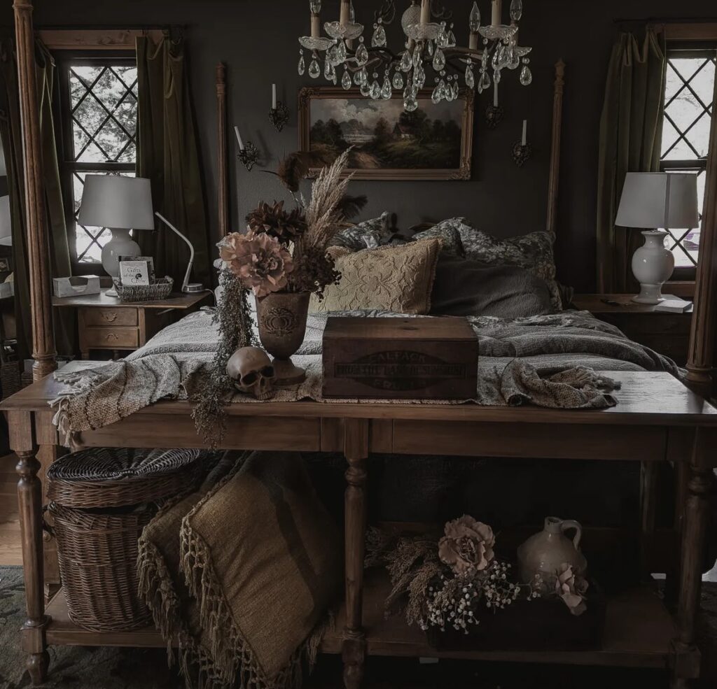 A dark academia bedroom with dried floral arrangements.