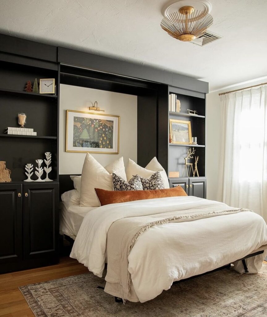 A bedroom with black shelves.