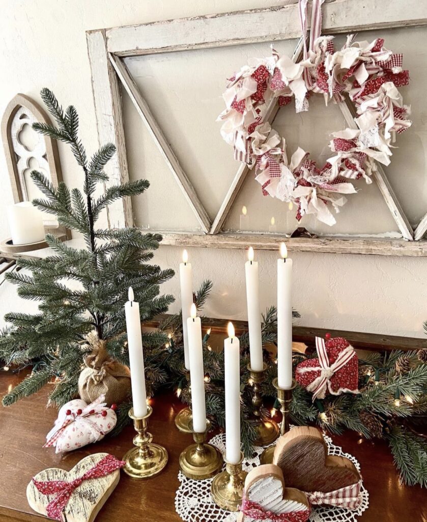 Heart cutouts with ribbon bows and pine branches.