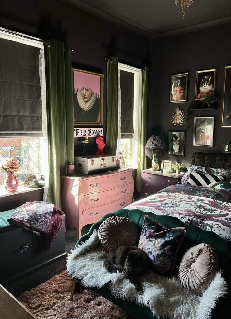 A bedroom with patterned pillows.