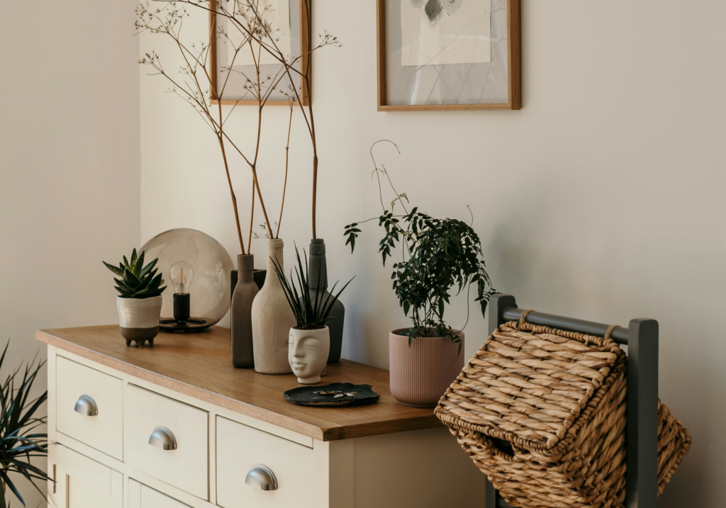 A dresser with vases.