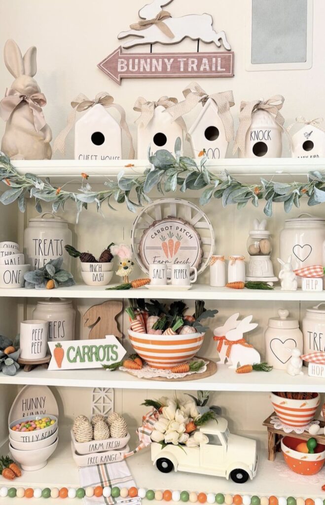 Easter canisters and mugs on a shelf.