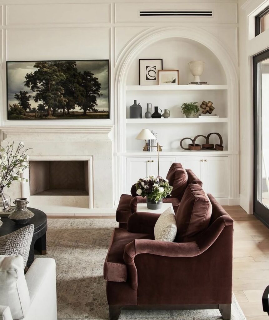 A modern living room with a velvet sofa.