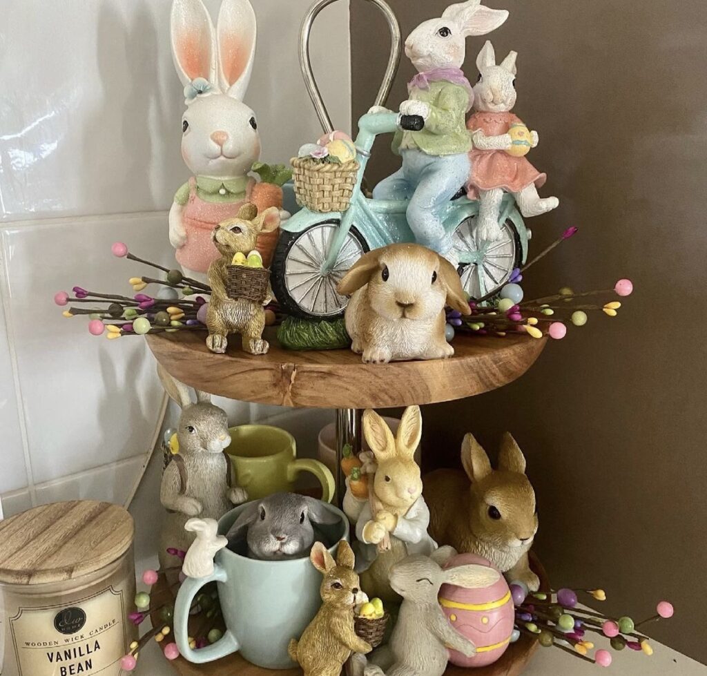 An Easter tray filled with rabbit figurines.