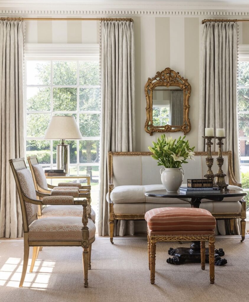 A classic living room with gold furniture.