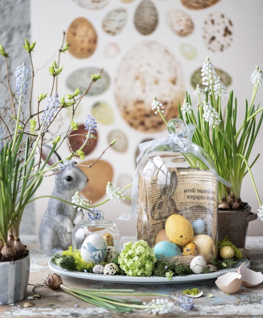 A glass cloche with Easter eggs.