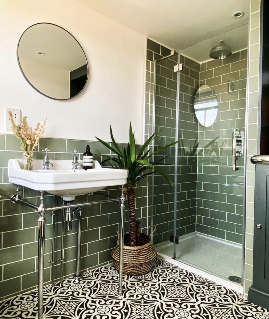 A monochromatic green bathroom.