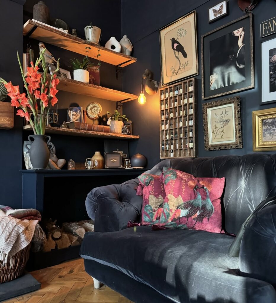 A black bedroom with cozy lighting.