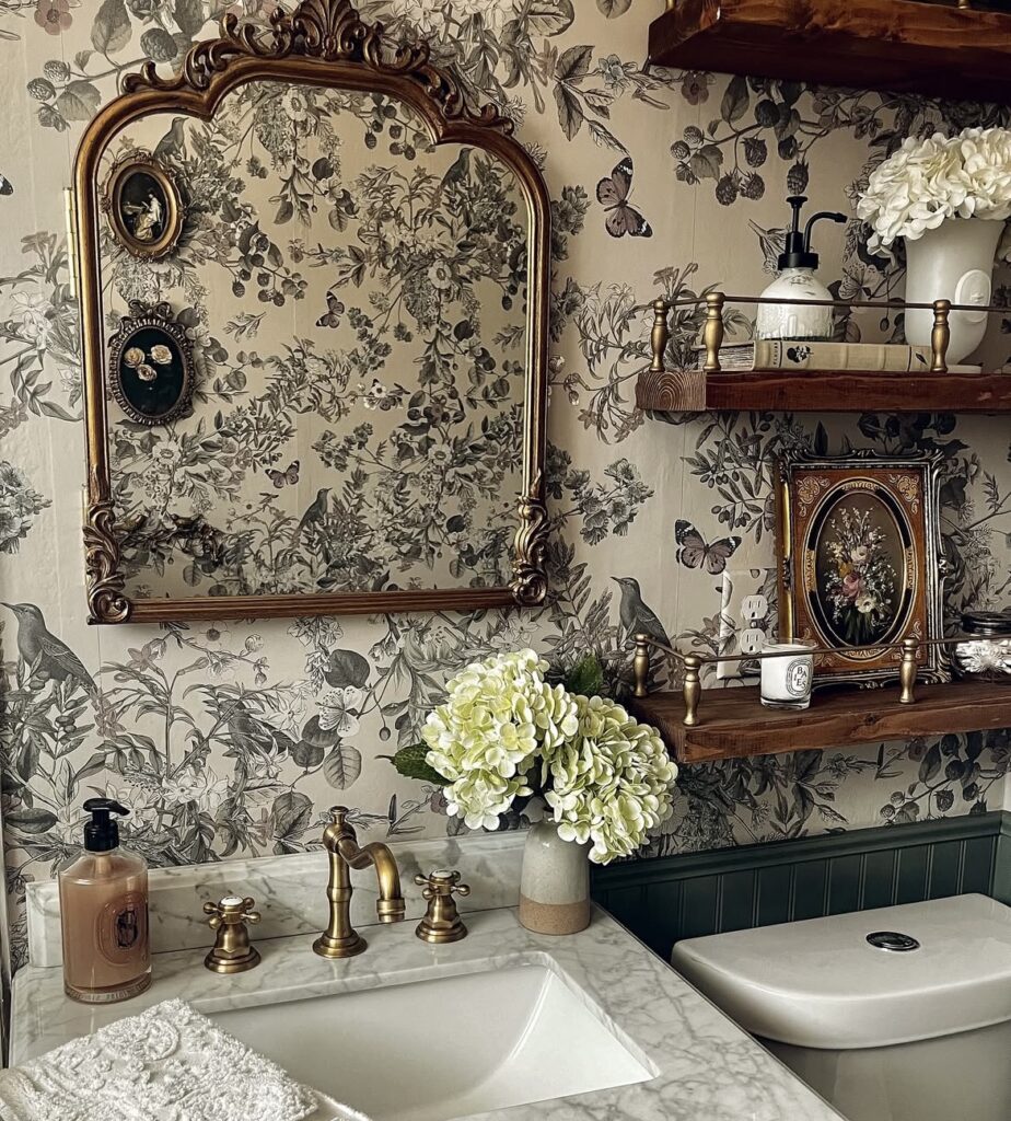 A bathroom with vintage floral wallpaper.